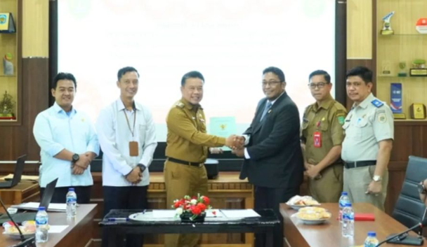 Pj Bupati Sukamara Tandatangani NPHD dan BAST Tanah untuk Pembangunan Pengadilan Negeri